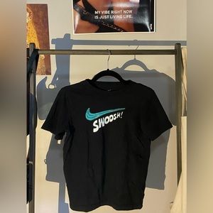 Very unique Y2K Nike t-shirt! Gently used, in great condition.